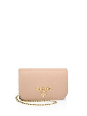 prada small curved flap mini crossbody bag
